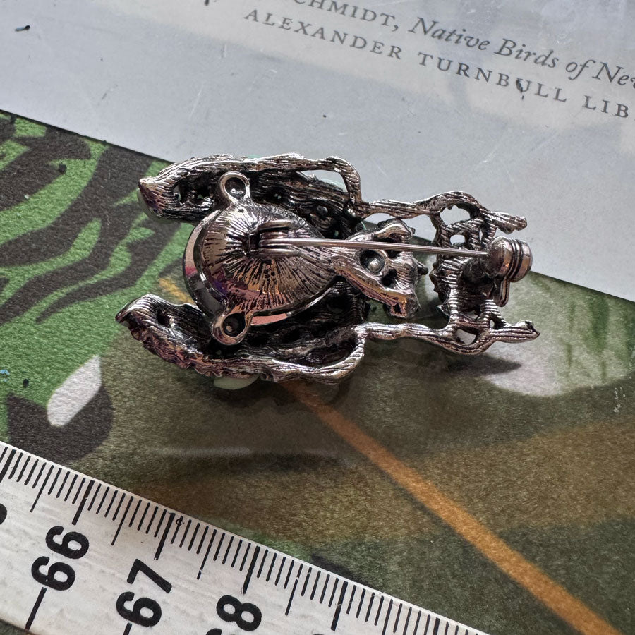 Green beetle brooch