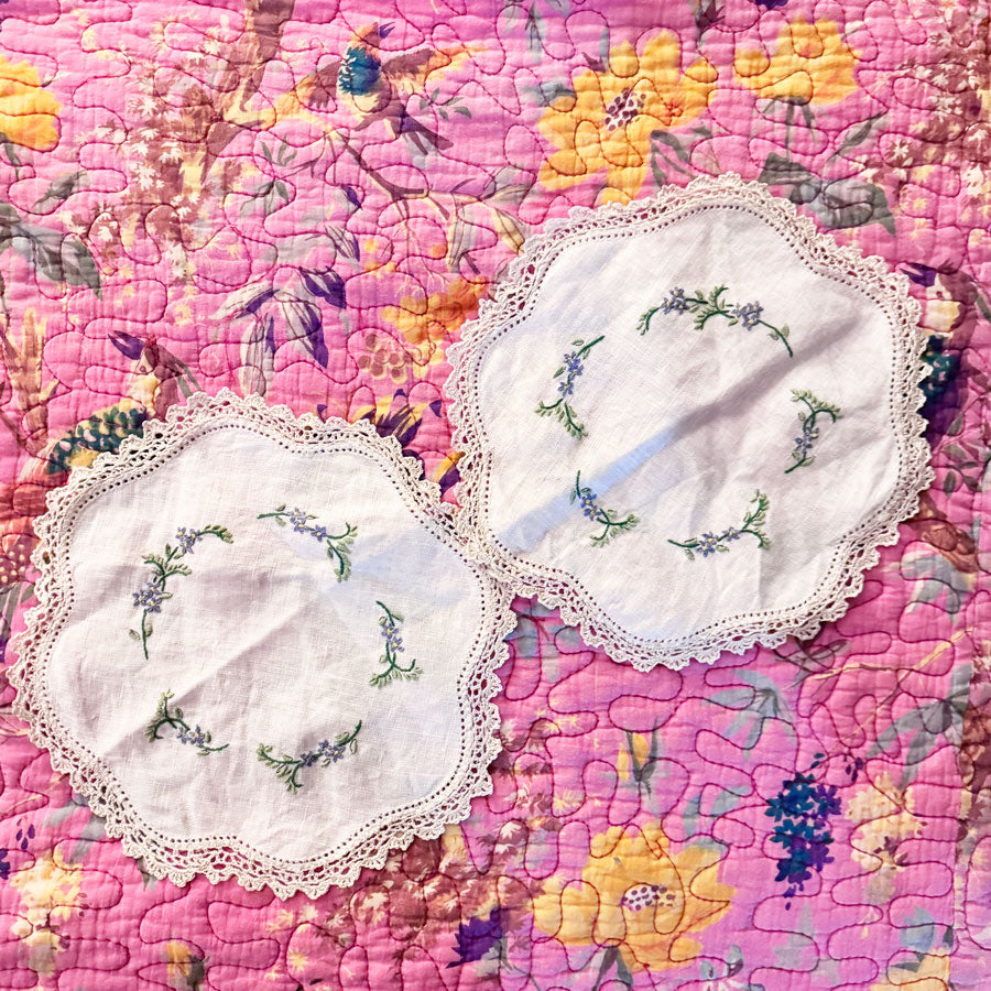 Set 2 round blue flower doilies