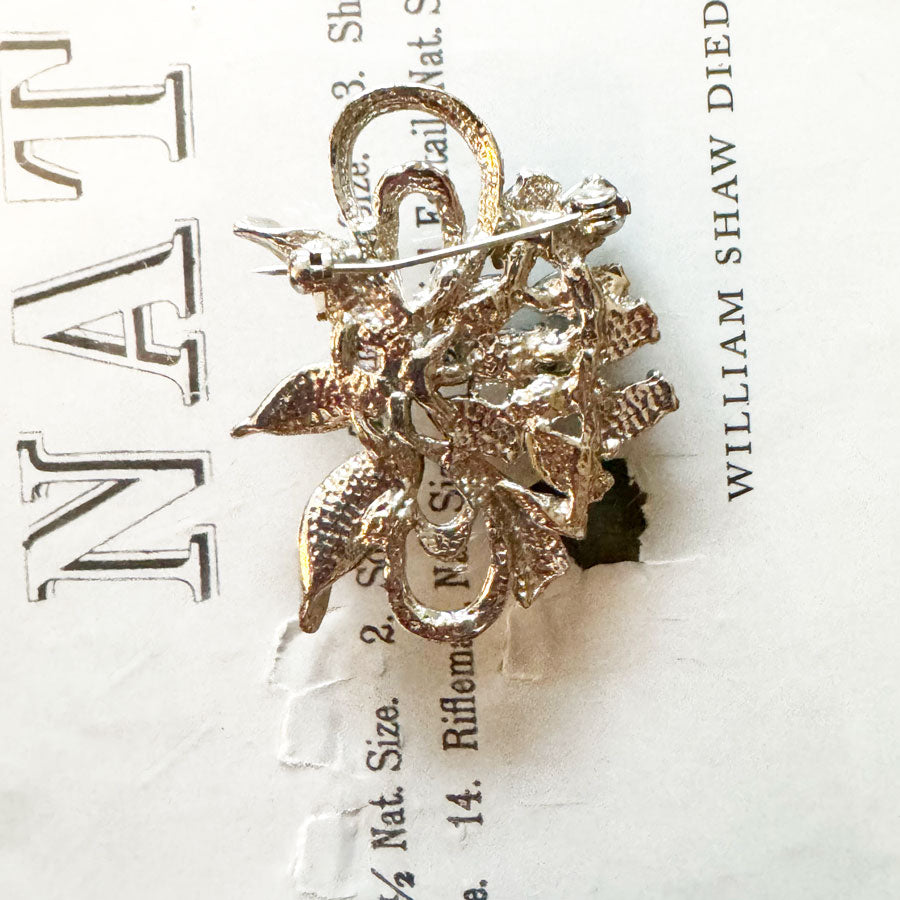 Costume jewellery brooch silver petals