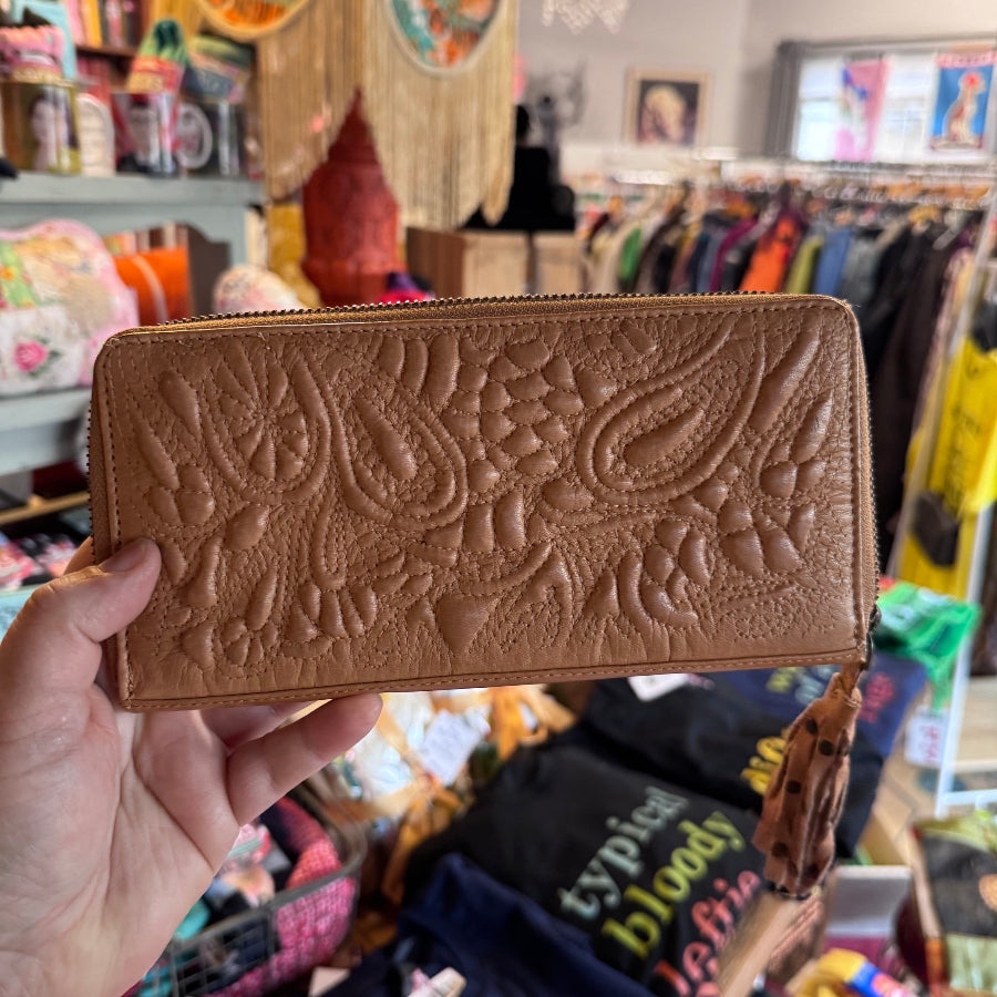 Tan tooled leather wallet