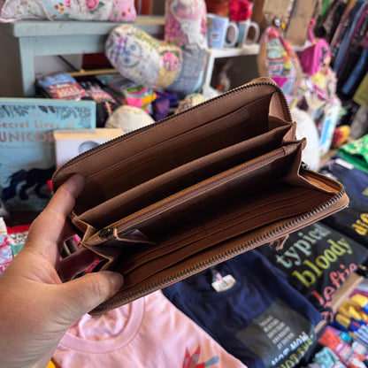 Tan tooled leather wallet