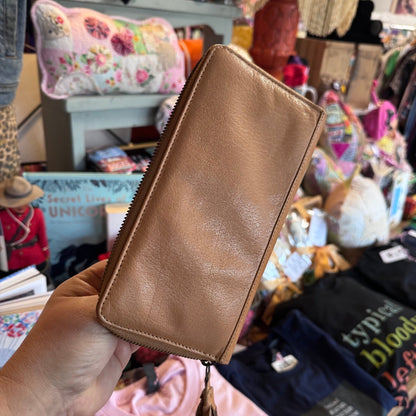 Tan tooled leather wallet
