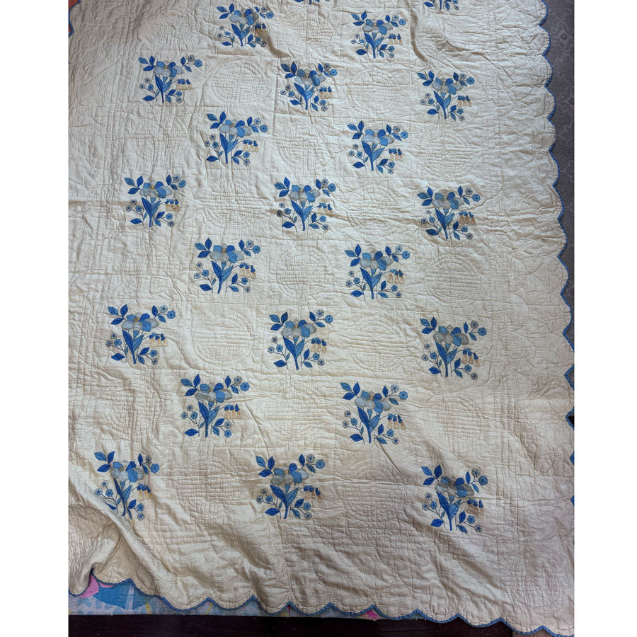Cream blue vintage quilt