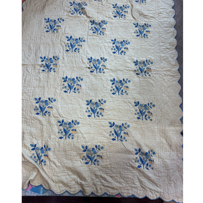 Cream blue vintage quilt
