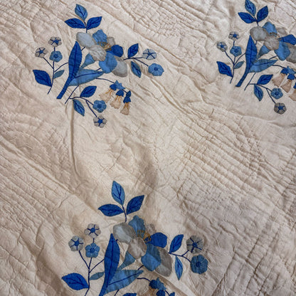 Cream blue vintage quilt