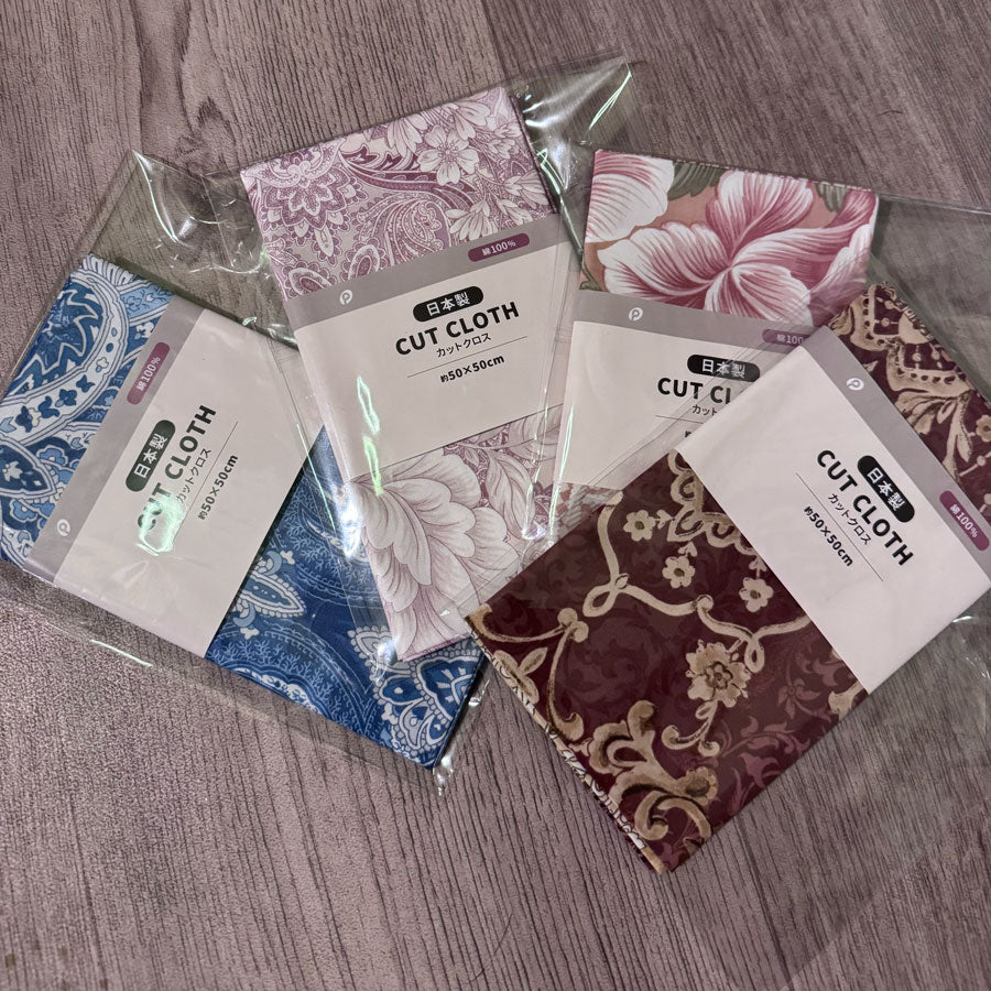 Floral cut cloth pieces