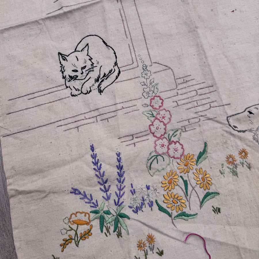 Unfinished embroidered apron