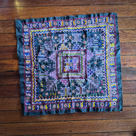 Black embroidered tapestry panel