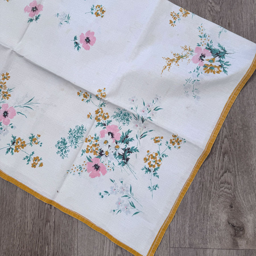 Yellow bordered floral tablecloth