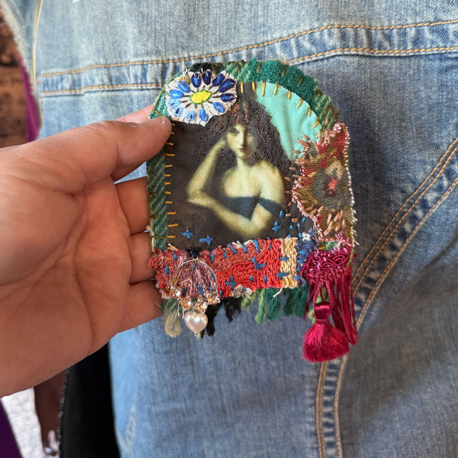 Moody moll brooch