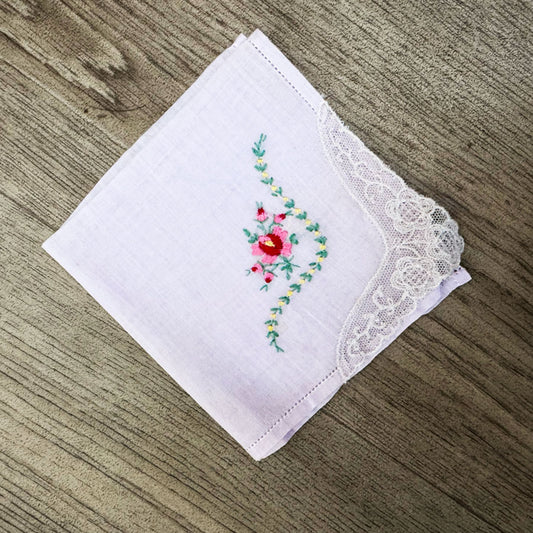 Embroidered pale pink hankerchief