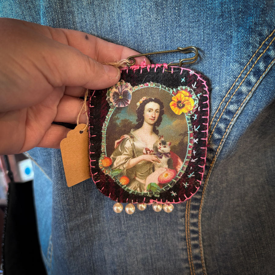 Pearl of wisdom brooch