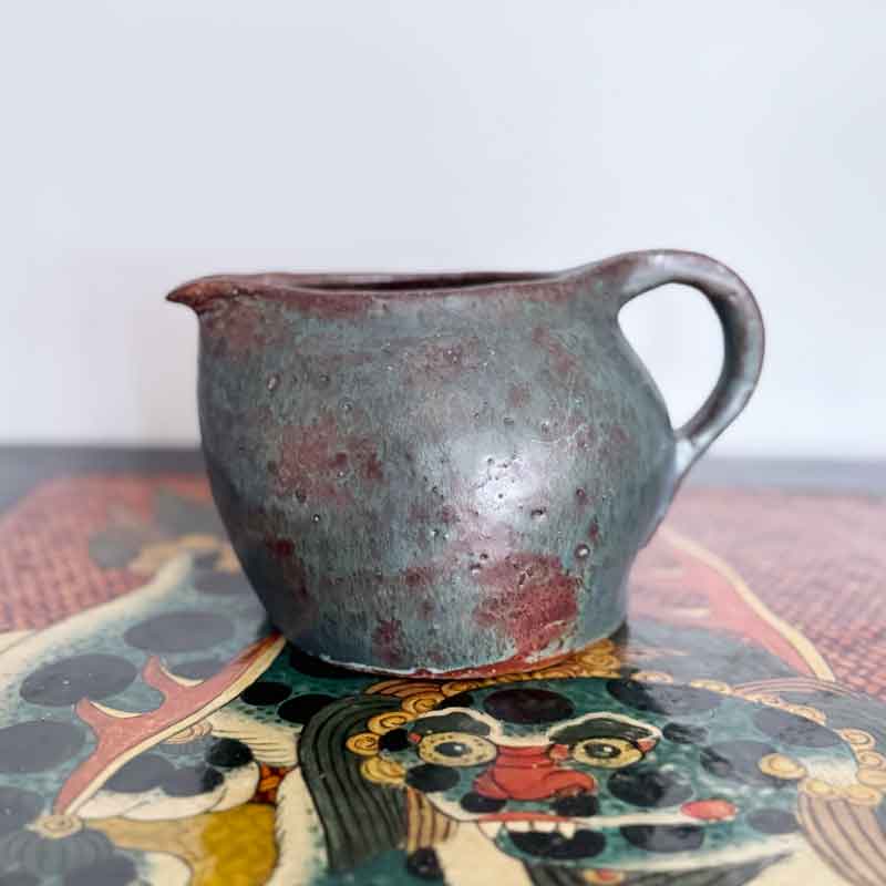 Green earthenware jug