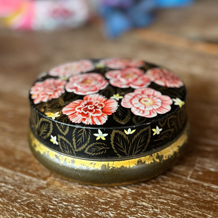 Round floral tin