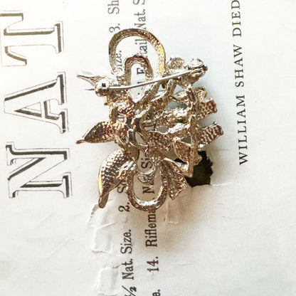 Costume jewellery brooch silver petals