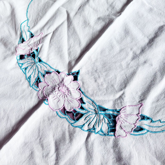 Cream embroidered tablecloth