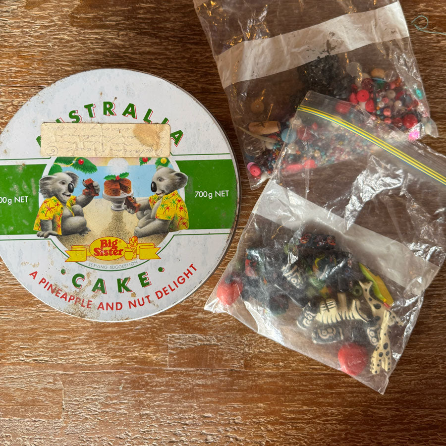 Vintage tin with beads