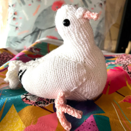 Hand knitted white pigeon